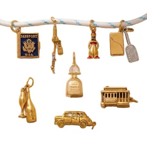 Sporty gold DIY charms for shoelaces and keychains featuring various travel and food designs