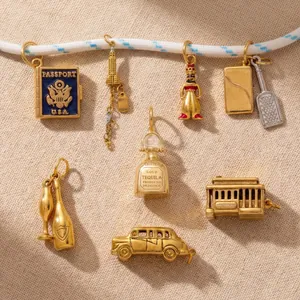 Detailed view of various gold-toned sports style DIY pendants for shoelaces and keychains