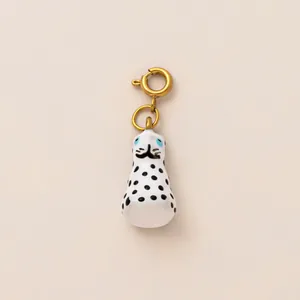 Adorable spotted white cat ceramic charm with 18k gold plated stainless steel clasp