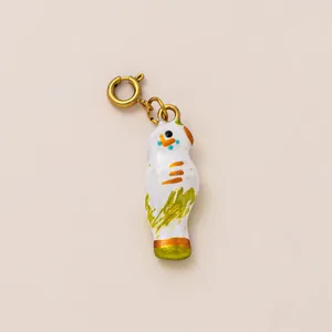 Artistic parrot-shaped charm with colorful painted details and a 18k gold-plated clasp