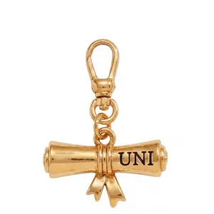 Gold graduation scroll metal charm with UNI engraving and lobster clasp for DIY jewelry.