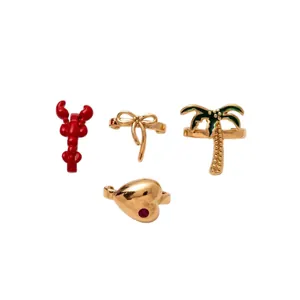 Set aus 4 DIY-Schuhanhängern mit Hummer-, Palmen-, Schleifen- und Herz-Designs.