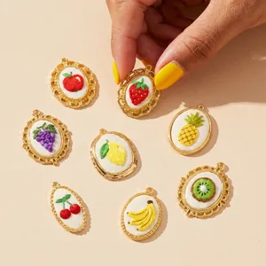 Colorful fruit embroidery pendants collection featuring strawberry, grape, and lemon designs
