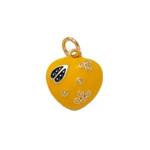 Yellow heart-shaped enamel charm with ladybug pattern for bags and fashion necklaces