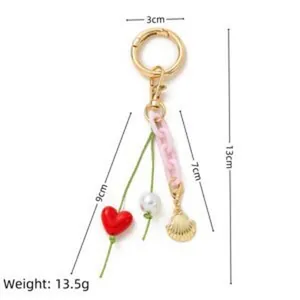 Llavero dorado colgante para bolso DIY con corazón rojo y concha detalles de medidas