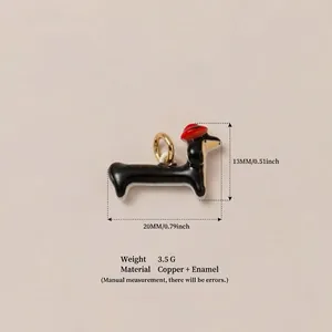 Detail view of enamel dachshund charm with 13mm by 20mm measurements and weight info