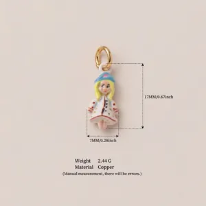 Detail view of colorful hand-painted girl doll pendant with dimensions and copper material info