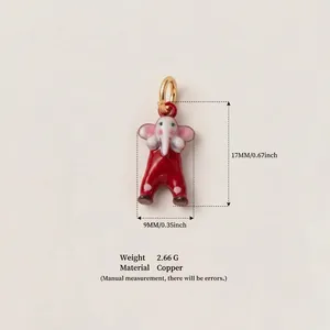 Macro detail view of hand-painted red elephant enamel charm with precise dimensions