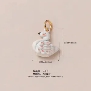 Detailed view of hand-painted white swan pendant with copper material and dimensions