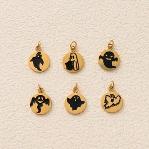 Close-up of 6 unique black ghost enamel patterns on gold stainless steel pendants