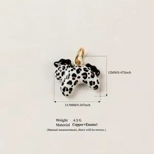 Detailed view of a handmade enamel puppy pendant with leopard print and size measurements