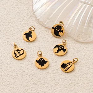 Detailed macro view showing six unique gold stainless steel Halloween ghost charms for DIY.