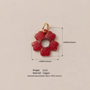 Detail view showing red enamel flower pendant dimensions and copper material info