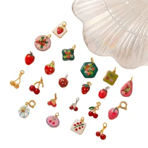 Cute fruit-themed stainless steel charms featuring strawberry and cherry enamel designs