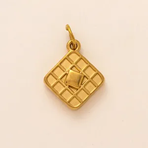 Detailed view of 18K gold-plated stainless steel square pendant with grid pattern