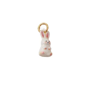 Charm lapin mignon en céramique blanche avec anneau en cuivre doré pour bijoux DIY