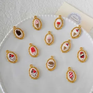 Detail view of various dessert-themed embroidered charms with ice cream and cookies