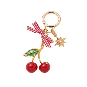 Luxury cherry keychain with red checkered bow and star charm in 18K gold plated finish