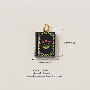 Detailed macro view of a vintage-style floral book pendant with copper material specs