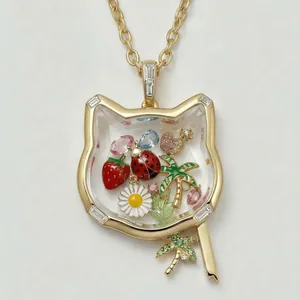Pendentif médaillon en verre tête de renard doré avec des charms colorés à l'intérieur