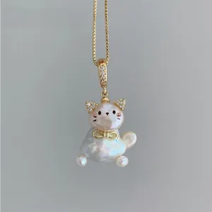 Elegant gold-plated clavicle necklace with a cute cat pendant made of baroque pearls
