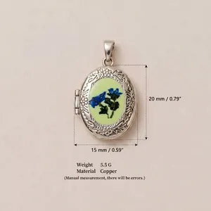 Vintage oval floral locket pendant in copper with 20mm x 15mm size dimensions guide