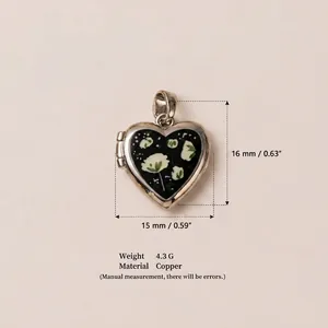 Detailed view of heart floral locket pendant with 16mm height and 4.3g weight