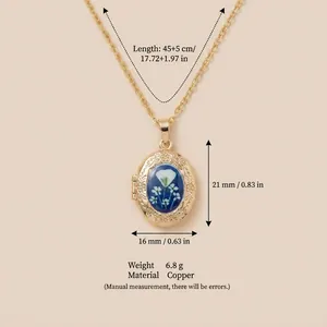 Collana vintage con medaglione ovale dorato con design floreale blu e misure