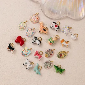 Collectie schattige keramische dierenhangers met 18K goud vergulde roestvrijstalen ringen