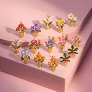 Detailed collection of twelve month birth flower enamel pendants in golden finish pots