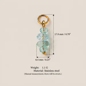 Détail d'un pendentif en acier inoxydable avec pierres bleues, dimensions et poids.