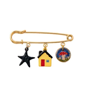 Gold 18K plated stainless steel safety pin brooch with star, house, and mushroom charms