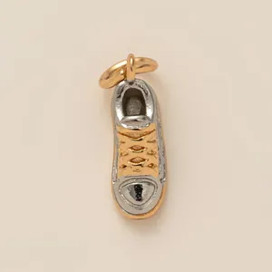 Detailed two-tone gold and silver mini sneaker charm pendant for DIY jewelry making