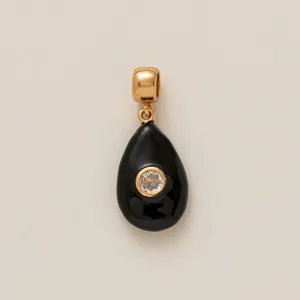 Elegant teardrop black enamel pendant with sparkling crystal inlay and gold-plated bail