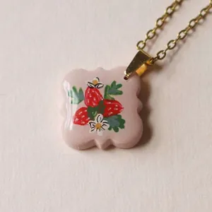 18K gold plated stainless steel necklace featuring a vintage strawberry flower print pendant