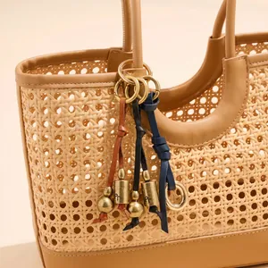Vintage Literary Leather Bell Pendant Distressed Bronze Design Woven Bag Accessory Hanging Ornament For Women Straw Bag Charms