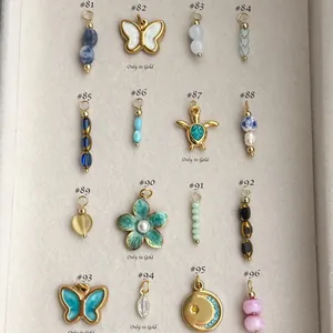 Cuadrícula de colgantes DIY de acero inoxidable bañados en oro de 18 quilates en varios diseños.