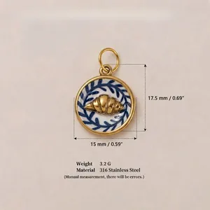 Detail of 18K gold plated stainless steel croissant pendant with 316SS material specs