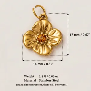 Edelstahlanhänger Blume mit Bernstein-Zirkon, Vintage-Gold-Finish, Größe 17x14 mm.