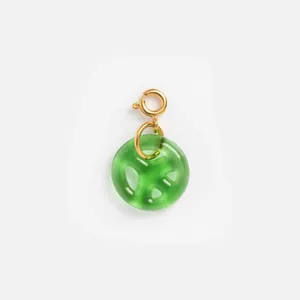 Close-up of a translucent green resin pendant with a gold stainless steel clasp.