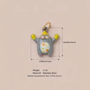 Detailed measurements of a whimsical grey monster enamel pendant in stainless steel