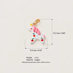 Detailed macro view of white unicorn pendant with dimensions and copper material specs
