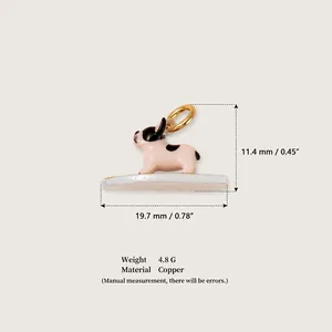 Detail view of surfing French Bulldog charm with 19.7mm x 11.4mm dimensions