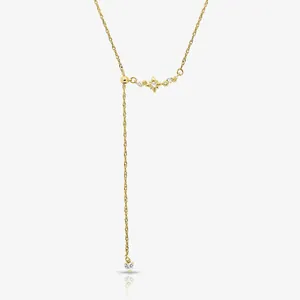 Elegante collar lariat dorado con colgante de estrella de ocho puntas y gemas