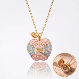 Exquisite pink gold-tone apple locket necklace featuring carousel design and crystals