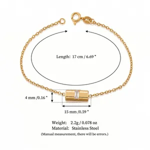 Bracciale in acciaio inossidabile dorato con pendente cilindrico e pietra di zircone