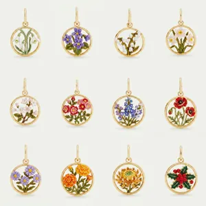 Grid display of 12 stainless steel enamel pendants featuring unique monthly birth flowers