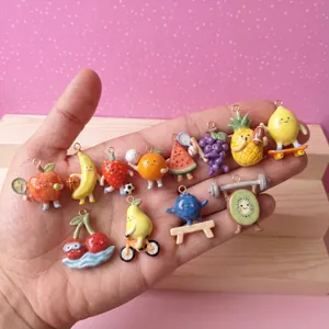 Set of vibrant handmade fruit sport character charms for DIY jewelry making projects