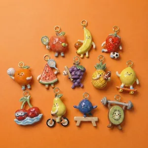 Set of twelve cute anthropomorphic fruit charms playing various sports for DIY jewelry making