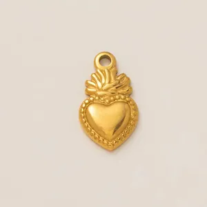 Detailed view of a vintage style golden stainless steel heart-shaped pendant accessory